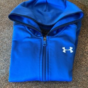 Fully zipped jacket with a hood.